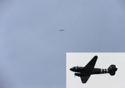 Dakota plane in the sky and a close up image of it