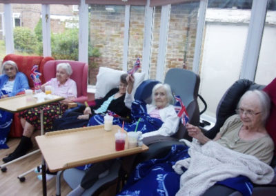 Residents at Loose Valley Care Home together in their lounge