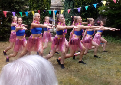 A group of girl dancers from girls from the Hilton Dance Academy performing at Loose Valley Care Home