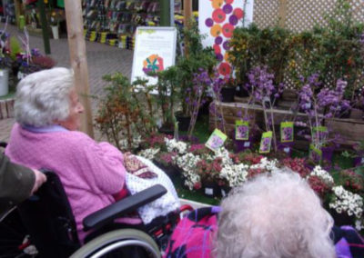 Loose Valley ladies looking at garden centre plants
