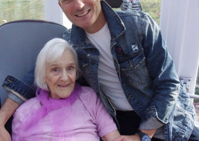 Entertainer Kevin Walsh with a lady resident at Loose Valley Care Home