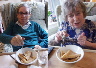 Residents enjoying pancakes