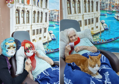 Loose Valley Care Home resident on Italy Day posing for photos with a Venice backdrop