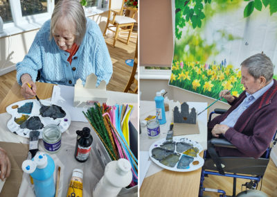 Loose Valley Care Home residents painting model castles