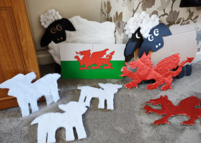 Painted Welsh dragons and fluffy sheep decorations