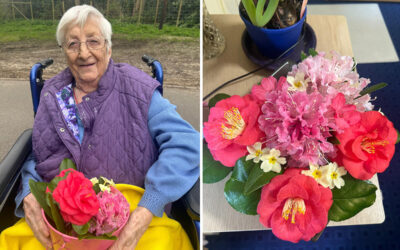 Loose Valley Care Home resident June enjoying outside and flowers