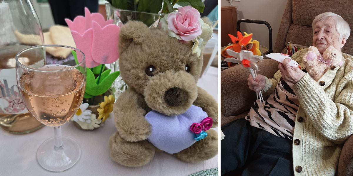 Mother’s Day table decorations with roses and resident holding gifts at Loose Valley Care Home.